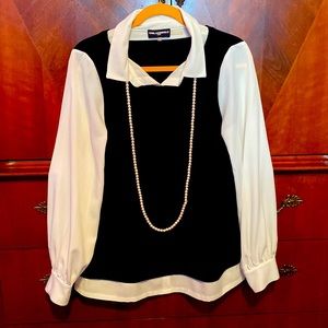 Karl Lagerfeld Blouse with Pearl Necklace.